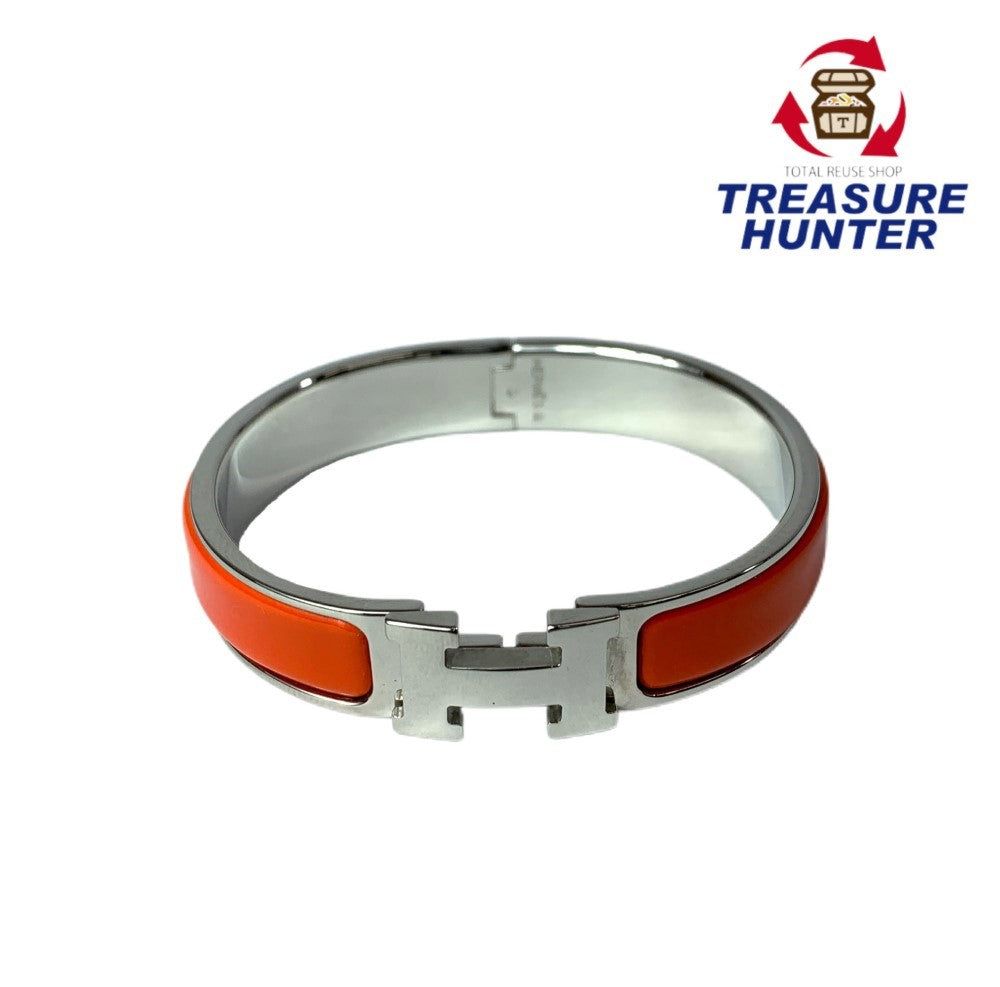 HERMES エルメス クリッククラック ブレスレット シルバー&times;オレンジ D刻印 レディース 【102058600001】｜Treasure　Hunter店