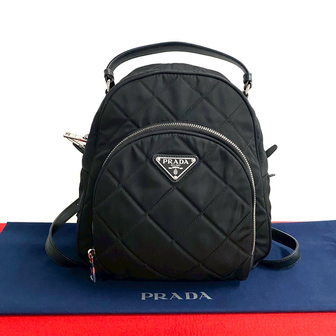 PRADA リュックバックパック三角口ゴグレーナイロンレザーグレー PRADA リュックバックパック三角口ゴグレーナイロンレザーグレー
