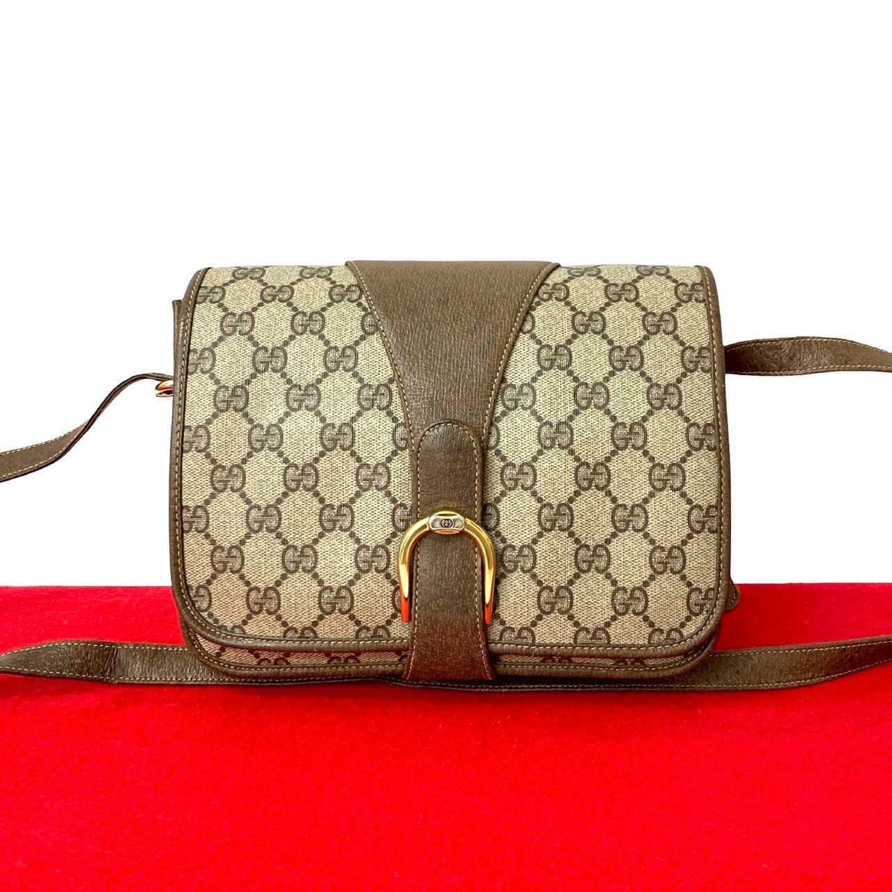 【尖んがり2倍】極 美品 GUCCI グッチ 年寄りのグッチ ヴィンテージ GG ロゴタイプ 金具 なめし革 本革 ショルダーバッグ ポシェット サコッシュ 赤銅色 128-5【貨物輸送無料】【中古】