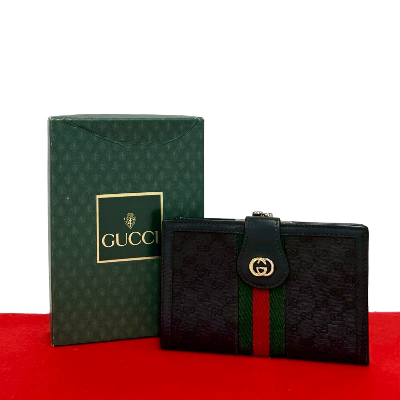 【尖んがり2倍】極 美品 箱付き添い人 GUCCI グッチ 年寄りのグッチ シェリー酒生産ライン マイクロGG ロゴタイプ 金具 なめし革 銭入れ 二つ折り 札入れ 黒いこと 33588【貨物輸送無料】【中古】
