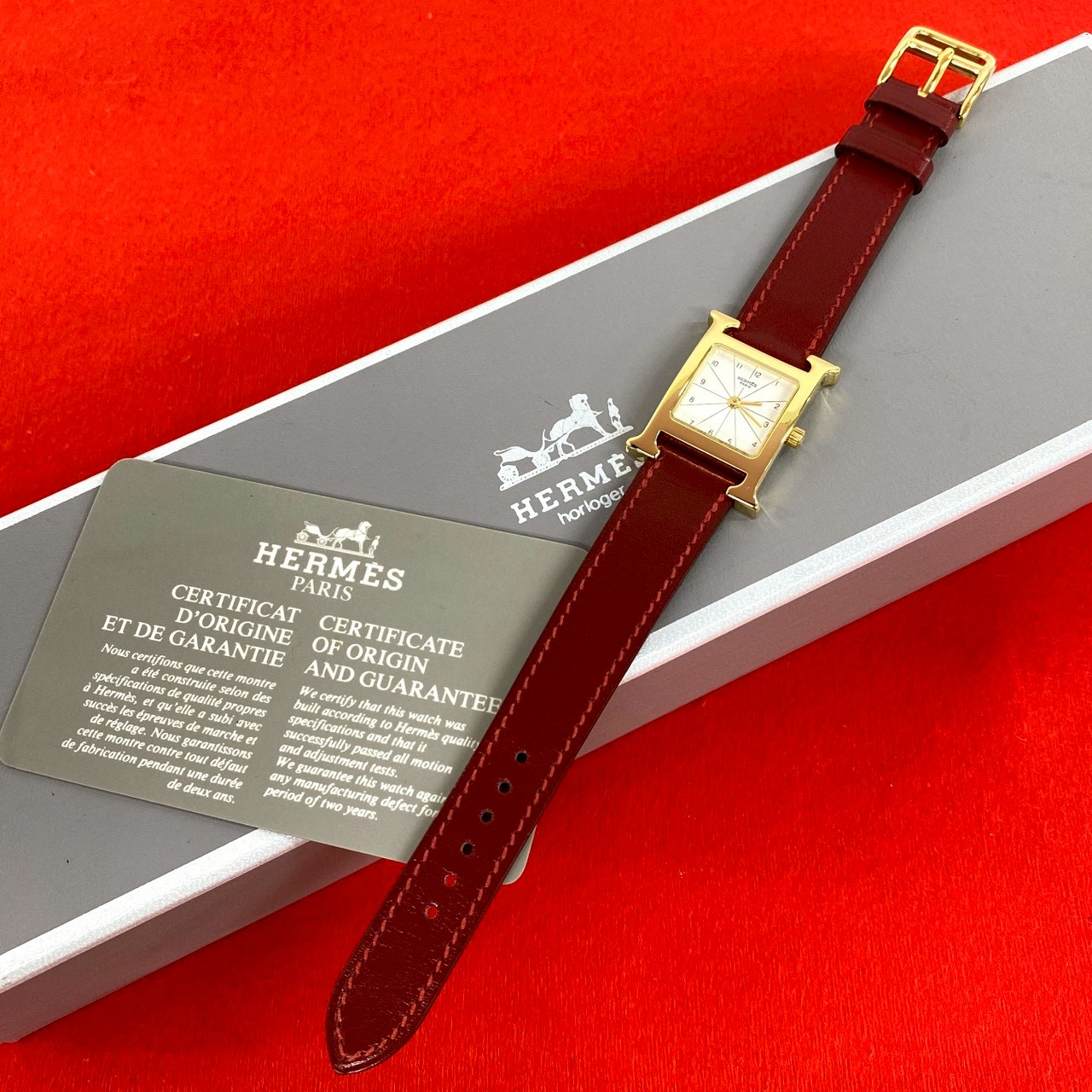 【尖んがり2倍】動く品 未当て嵌める庫入れ品 箱付き添い人 HERMES エルメス H御覧になる GP なめし革 本革 石英 ウオッチ 赤いこと ゴールド 25794【貨物輸送無料】【中古】
