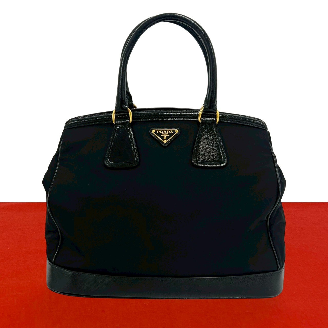 【ポイント2倍】ほぼ未使用 希少品 PRADA プラダ 三角 ロゴ プレート 金具 ナイロン レザー 本革 ハンドバッグ ミニトートバッグ ブラック 黒 38001 【送料無料】【中古】|Trip Vintage