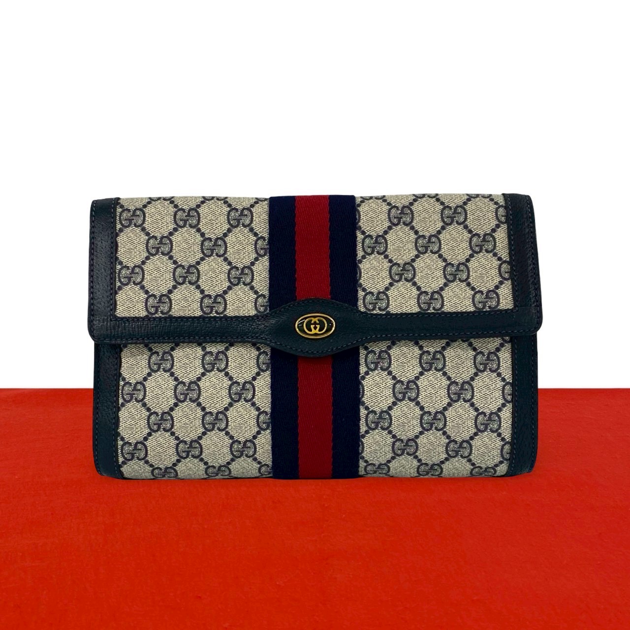 【ポイント2倍】極 美品 GUCCI グッチ オールドグッチ ヴィンテージ シェリーライン GG ロゴ 金具 柄 レザー 本革 クラッチバッグ ネイビー 355-3 【送料無料】【中古】｜Trip Vintage