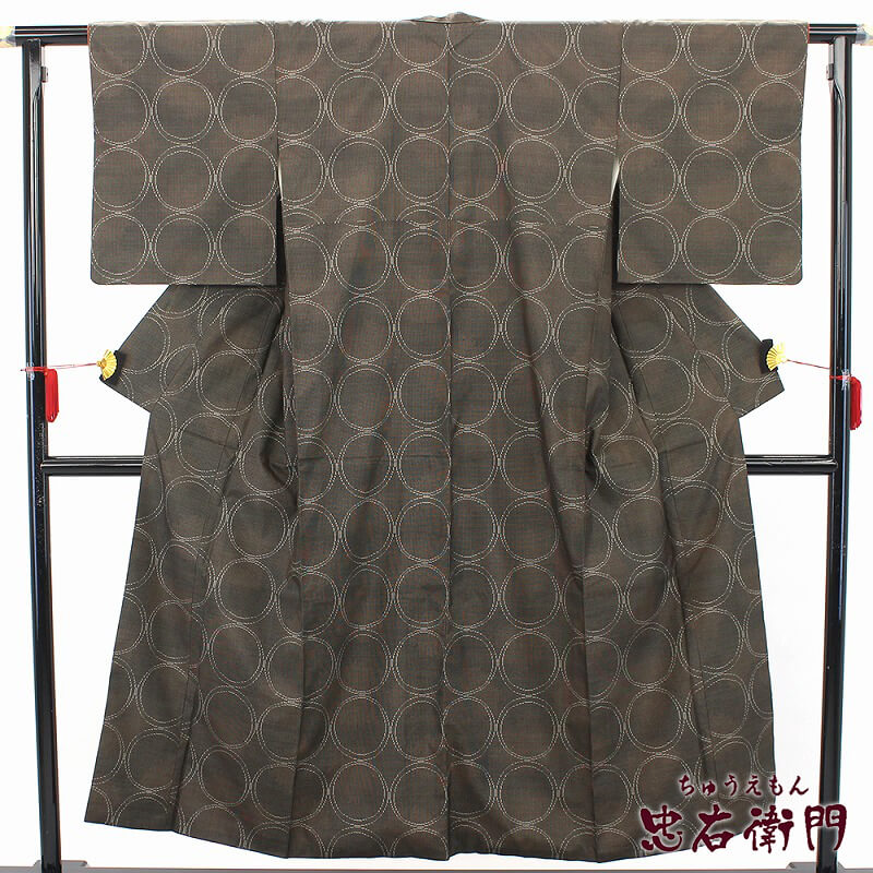 【中古】大島紬 紬 レディース 正絹 茶 ぼかし 丸文 身の丈156.5珊 裄丈64珊 M大きさ好いかげんに 仕立てもの売り上げ高御召しもの 心地よい 貨物輸送無料 相応う