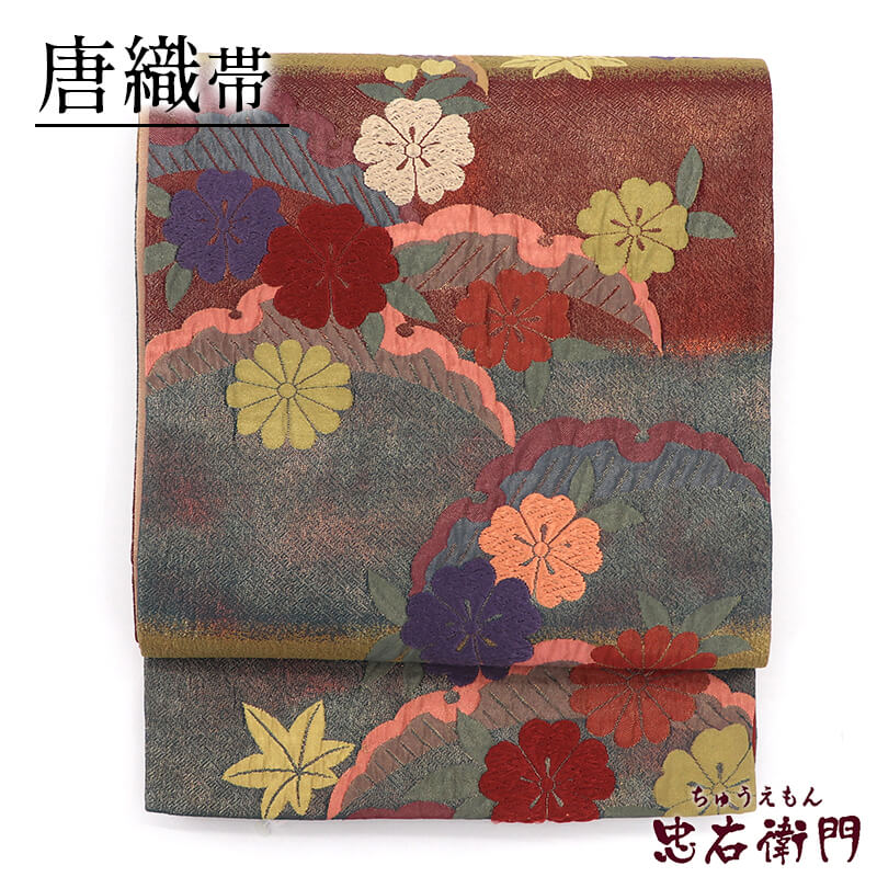 【中古】 袋帯 唐織 正絹 六通柄 金茶 臙脂 雪輪 花柄 長さ427cm 幅31cm リサイクル 和装 礼装 フォーマル 着物 仕立て上がりリサイクル帯 送料無料 即日発送