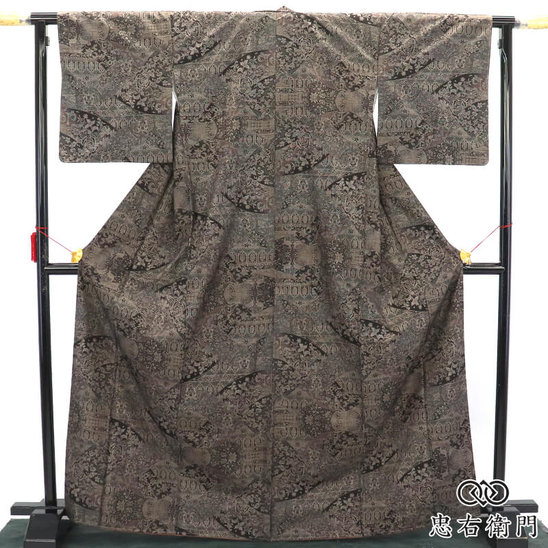 【中古】 美品 証紙付 発祥地大島紬 しつけ糸付 大島紬美幸 袷 レディース 正絹 黒 向い鳳凰 唐花 オリエンタル 身たけ171糎 裄丈67.5糎 お出掛け 同窓会 観劇 L大きさ好いかげんに 再利用御召しもの リユース御召しもの 中古御召しもの 貨物輸送無料 即日送りとどける