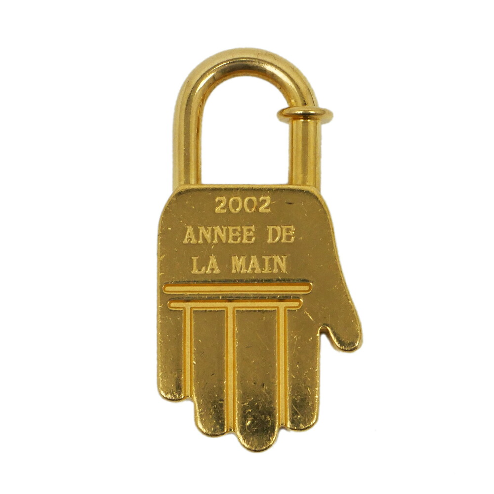 【名東】【HERMES】エルメス カデナ ハンドモチーフ 2002年限定 ゴールド ANNEE DE LA MAIN チャーム 小物【中古】｜質ウエダ