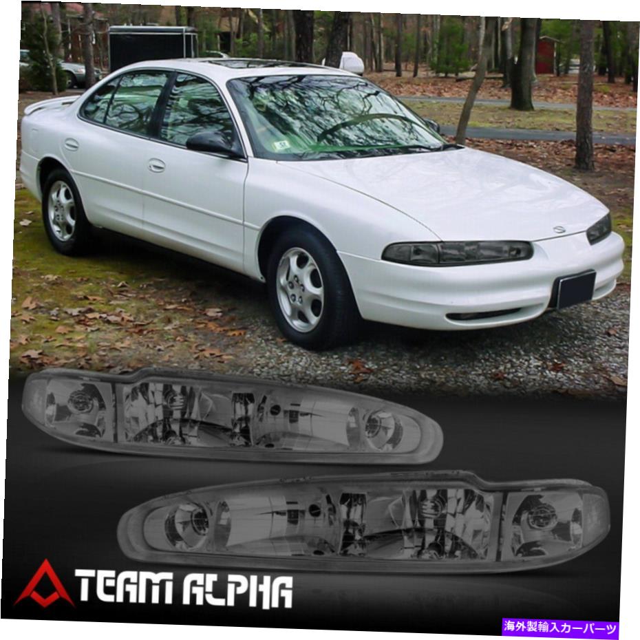 USヘッドライト フィッツ1998-2002 oldsmobile intigue [Chrome / Smoke]クリスタルコーナーヘッドライトランプ Fits 1998-2002 Oldsmobile Intrigue [Chrome/Smoke] Crystal Corner Headlight Lamp【並行輸入品】