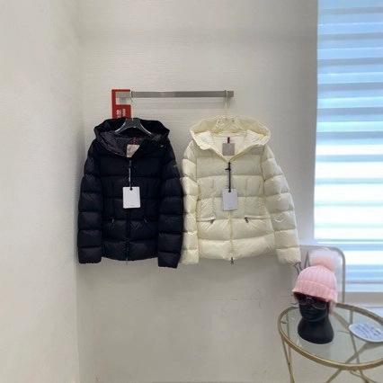 深センの 南 油の ハイエンドの 婦人 服は 腰を 収めて 帽子を つないで 長袖の 白い ガチョウの 羽毛の ダウン ジャケットの 女性を 修理 します。