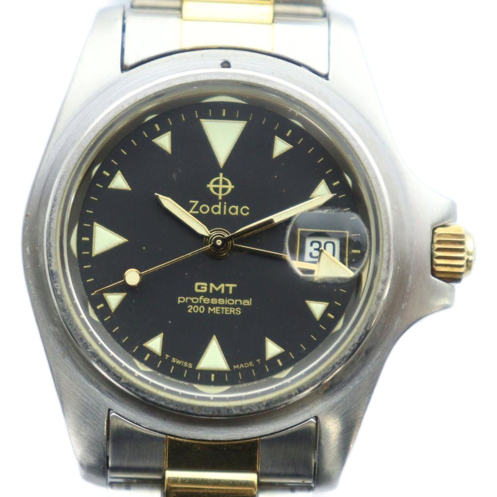【中古】ゾディアック Zodiac 813.22.06 GMT 職業的 200M ウォッチ 御覧なさる 水晶 黒文字盤 暦付き添い人 デイト 二人組色合い しろがね色色 ゴールド色 ■GY18 /MQ メンズ 【ベクター 古着】 251209 腕時計-メンズ腕時計