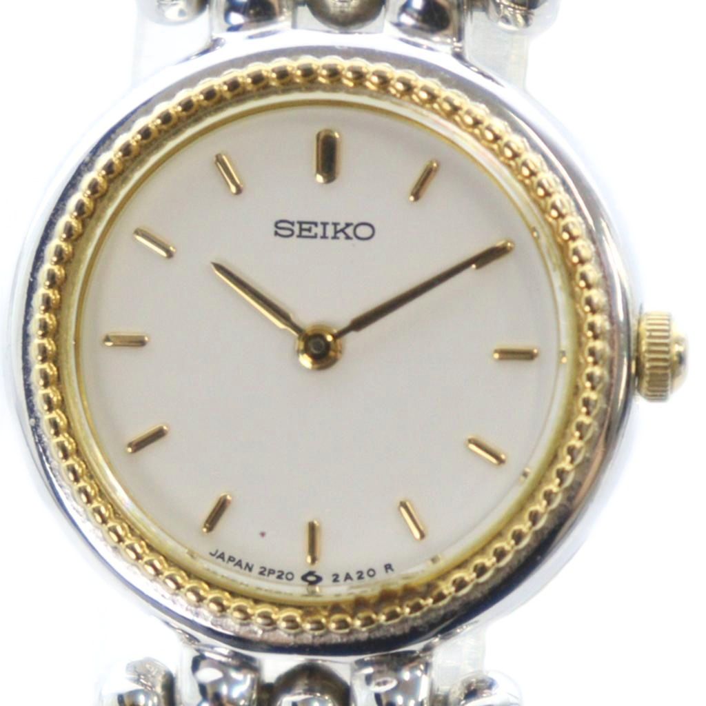 【中古】セイコー SEIKO 2P20-0E90 腕時計 ウォッチ クォーツ 白文字盤 ロゴ ゴールド色 シルバー色 ■GY18 /MQ レディース 【ベクトル 古着】 251226 9,869円