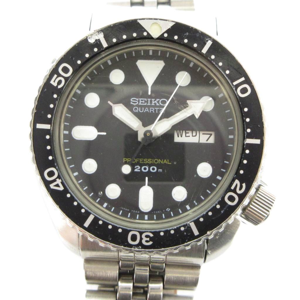 【中古】セイコー SEIKO ジャンク品 プロフェッショナル 200M ダイバーズ ウォッチ 7548-7010 腕時計 クォーツ 黒文字盤 カレンダー付き デイデイト シルバー色 ■GY18 /MQ メンズ 【ベクトル 古着】 260404｜ブランド古着ベクトルプレミアム店