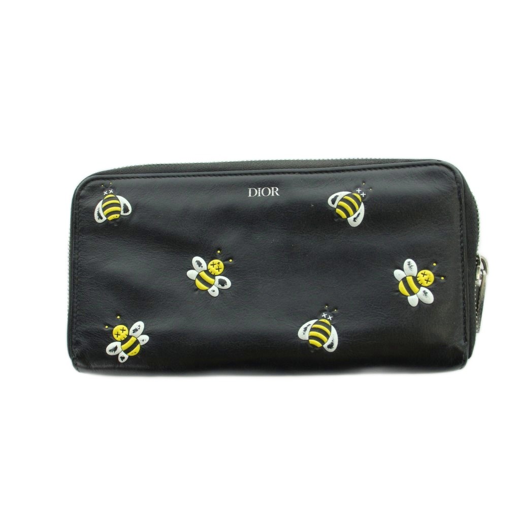 【中古】ディオール Christian Dior KAWS 長紙入れ ウォレット BEE 総柄 ロゴタイプ なめし革 ラウンドジッパー 黒 黒いこと ■GY18 /MQ ■OH メンズ 【ベクター 古着】 260409