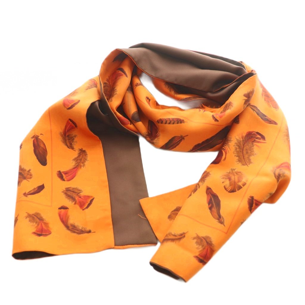 【中古】エルメス HERMES リヴァーシブル えり巻き 薄っぺら 地絹 羽毛柄 オレンジ色 茶 /MI ■os ■OH レディース 【ベクター 古着】 260415