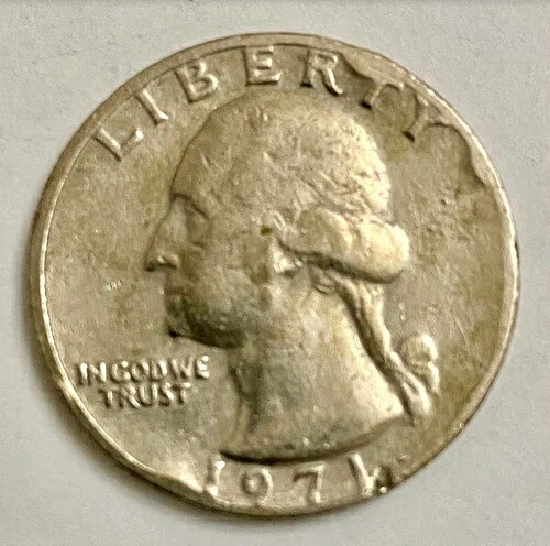 1971年 25セント銀貨、ミントマークなし、縁と自由の女神像が重なり合ってエラーあり。