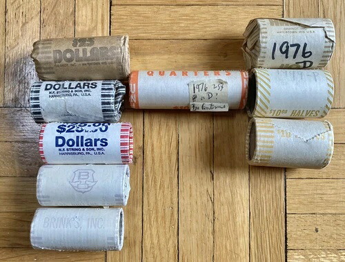 9ロールの銀行包装されたハーフドルとドルの一部（一部OBW）額面165ドル