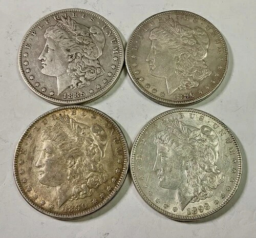 1885年、1890年、1896年、1898年の4枚のモルガングループの混合グレードのコイン