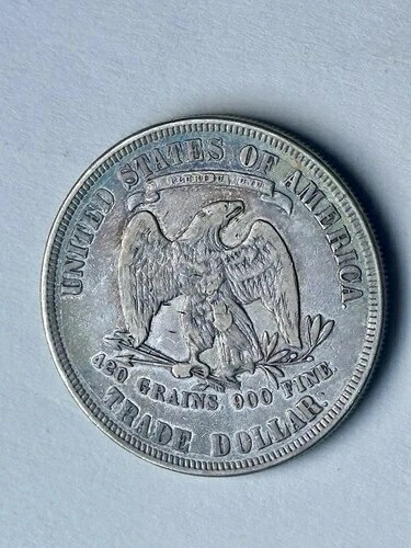 1877年貿易ドル - アメリカ合衆国の象徴的な銀貨 - 希少発行