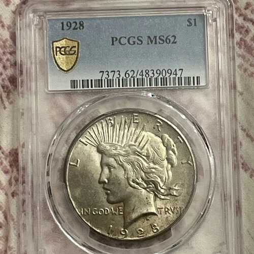 1928年ピースシルバー 1ドル PCGS MS 62 多少の変色あり