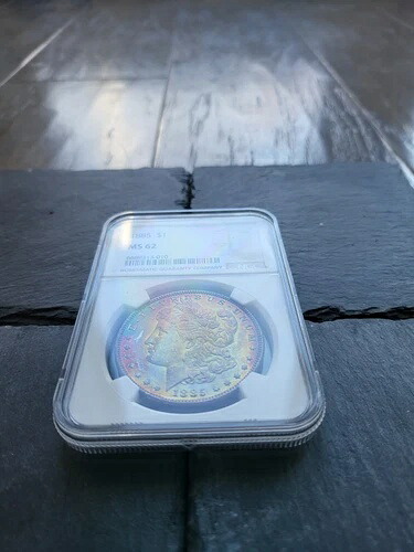 1885年 モルガン銀貨 NGC MS62 モンスターレインボートーン