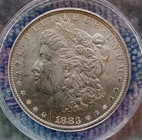1883 O モーガン シルバー ダラー O/O ミント マーク ANACS グレード MS 63 。