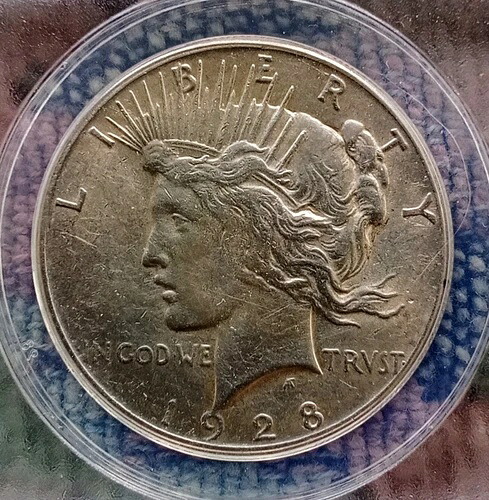 1928 P シルバー ピース ダラー、ANACS グレード AU 58 状態。