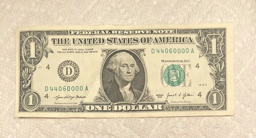 ファンシーシリアル番号 US $1 D紙幣 D44060000A。 低鋳造、クール度98%-