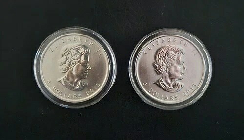 2013年産 カナディアン・シルバー・メープルリーフス 2個入り。ミルクスポット入り 1オンス。カプセル入り。12325B