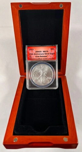 2011 年 1 ドル シルバー アメリカン イーグル、ANACS により MS-70 と評価、初リリース 25 周年。