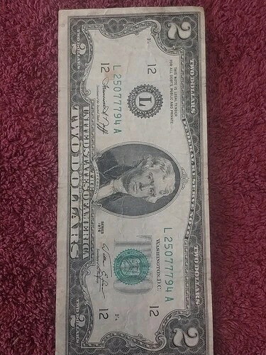 希少な1976年2ドル紙幣。シリアルナンバー777。ラッキー$%