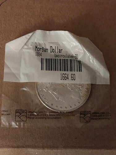 1884-P モルガン銀貨（未流通）フィラデルフィア造幣局発行、未開封