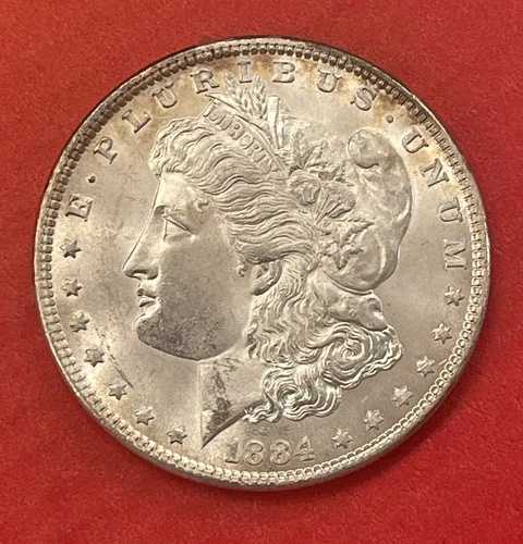 1884 年 P モーガン シルバー ダラー、ジェム アンサーキュレート。