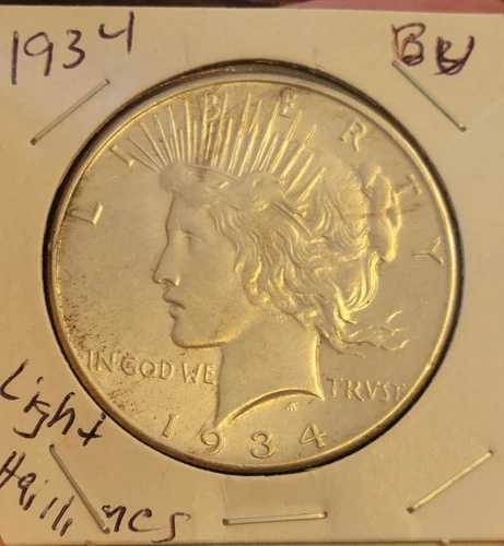 1934年ピース銀貨（BU、軽度のヘアラインあり）