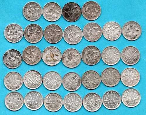 オーストラリア シルバー スリーペンス コイン 32 枚。すべて異なる日付 1910 - 1963 年。一括購入。