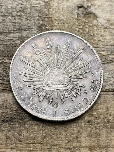 1886年メキシコ8レアル、アジア商人の刻印入りアンティークシルバークラウンコイン