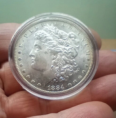 1884-O モルガン銀貨 ブリリアント 未流通 リムトーン 未認定