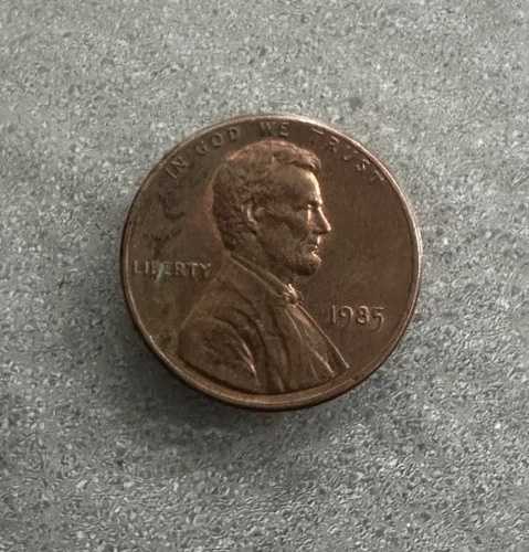 1985 年リンカーン ペニー セント、ミントマークなし、縁にエラーあり。
