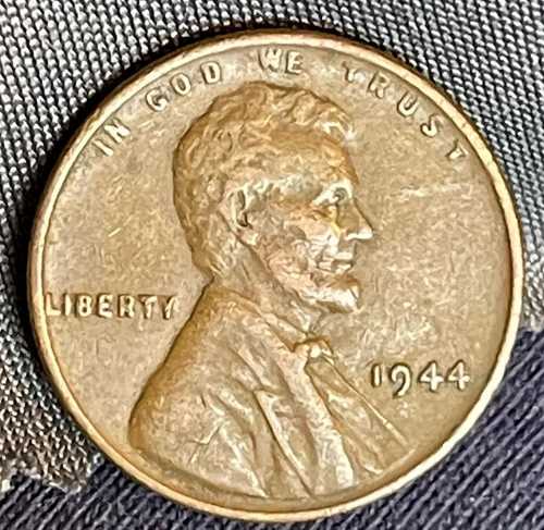 1944 年リンカーン小麦 1 セント硬貨、縁のエラー「L」、リバティ。