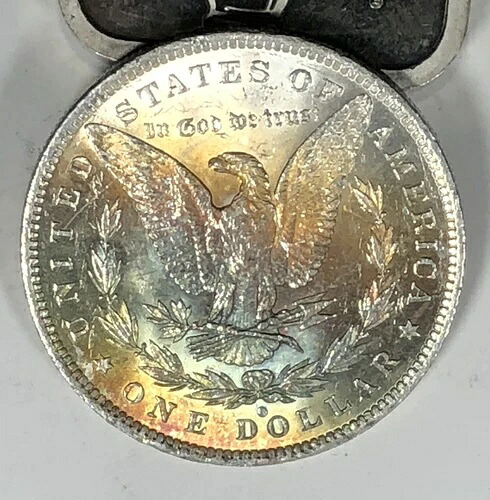1884-O トーン・モルガン・ダラー。1ドル。裏面は見事な虹色トーン。
