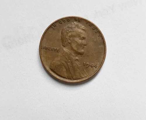 1944年小麦ペニー、ミントマークなし、縁のリバティに「L」エラー