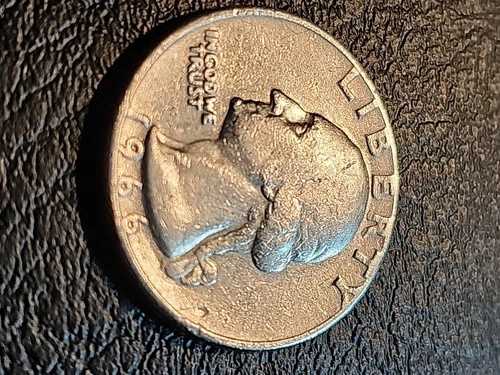 1966 年ワシントン 25 セント硬貨には複数のエラーがあります。
