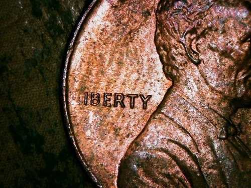 1986年のDペニー硬貨「IBERTY」と表示され、Lは表示されていない
