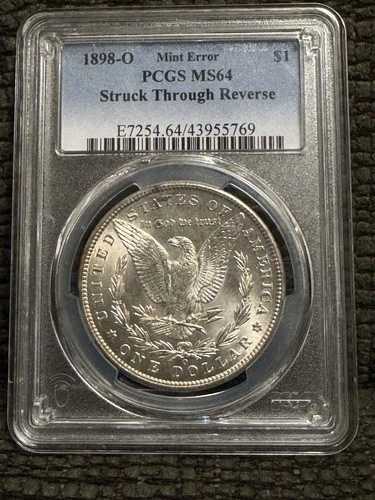 1898-O モルガン・ダラー MS-64 PCGS (造幣局の誤りにより刻印が剥がれています)「壊れた翼」
