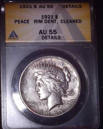 1921年ピースシルバードル、ANACS AU 55。高浮き彫り