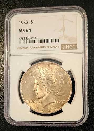 1923 年ピース シルバー ダラー - NGC MS 64 - 素晴らしい宝石 BU、かすかな金色の色合い!
