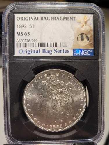 1882年モルガン・ダラー NGC MS63 ブラックコア（オリジナルバッグの破片付き）