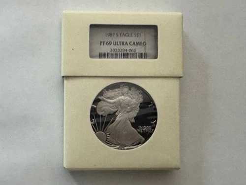 1987-S $1 アメリカン シルバー イーグル NGC PF69 ウルトラ カメオ（インターセプト シールド ボックス付き）
