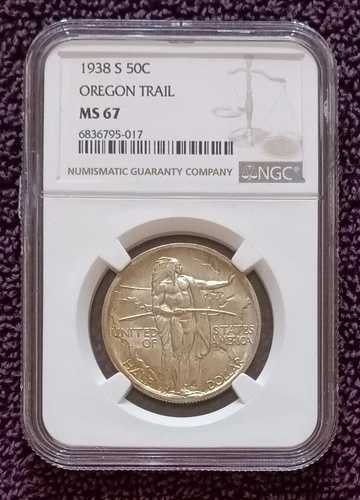 1938-S オレゴン記念ハーフドル、NGC MS67; 縁にブロンズ加工