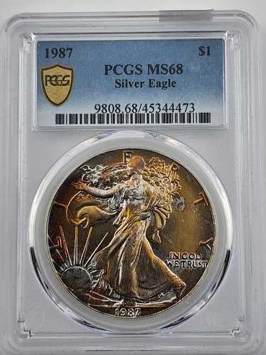 1987 年アメリカン シルバー イーグル - PCGS MS68 ゴールデンイエローの表面はトーン加工済み!｜WORLD RESOURCE【QUEEN店】