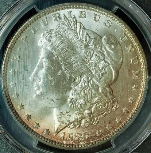 1887-P モルガン銀貨 MS63 強い金黄色の三日月模様